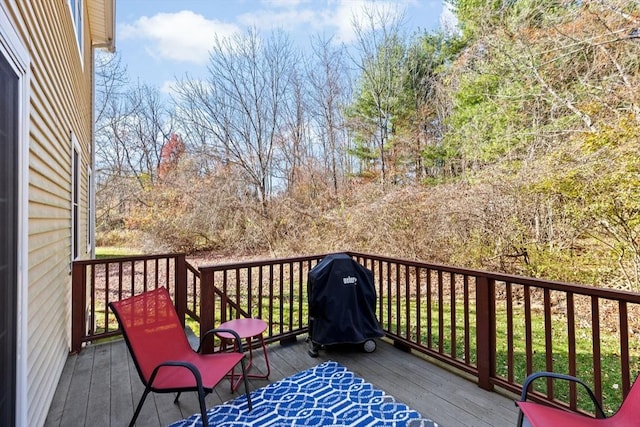 wooden terrace with grilling area