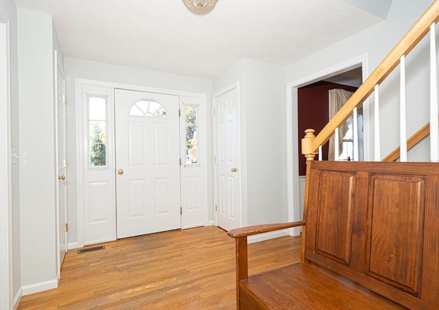 entrance foyer featuring light hardwood / wood-style flooring