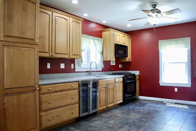 5 Leedburg St, Chelmsford, MA 01863 - kitchen featuring beverage cooler, black appliances, healthy amount of natural light, a ceiling fan, and recessed lighting