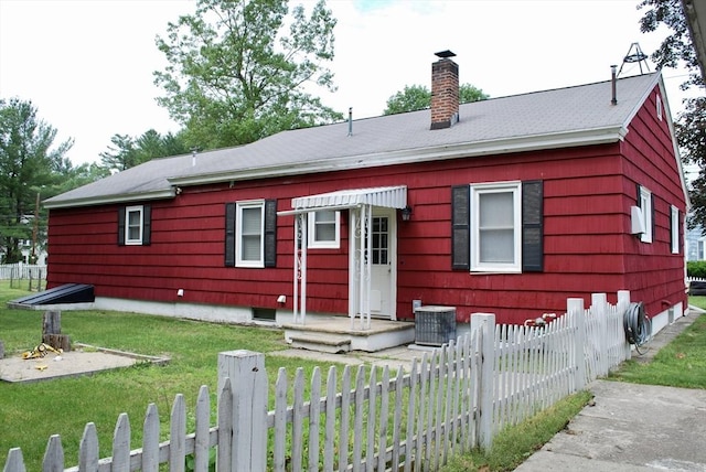 5 Leedburg St, Chelmsford, MA 01863 - view of front of home featuring a chimney