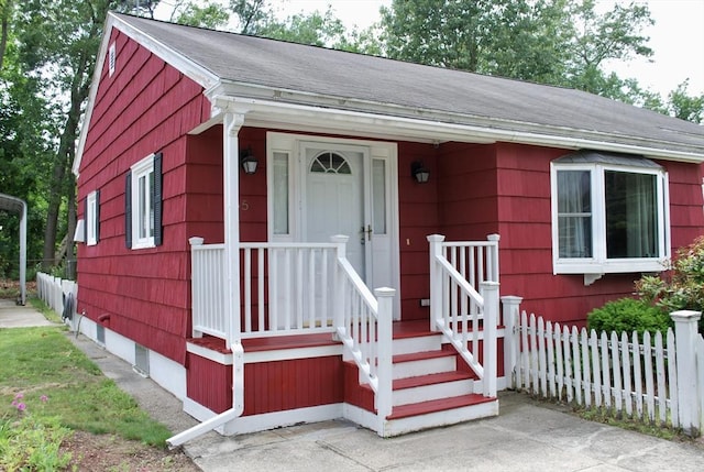 5 Leedburg St, Chelmsford, MA 01863 - view of front of property with roof with shingles