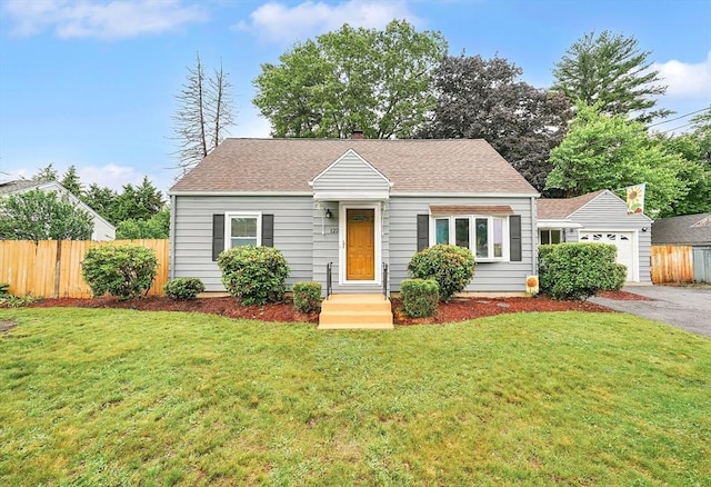 122 Brookside Cir, Springfield, MA 01129 - view of front of home with driveway, a shingled roof, and a garage