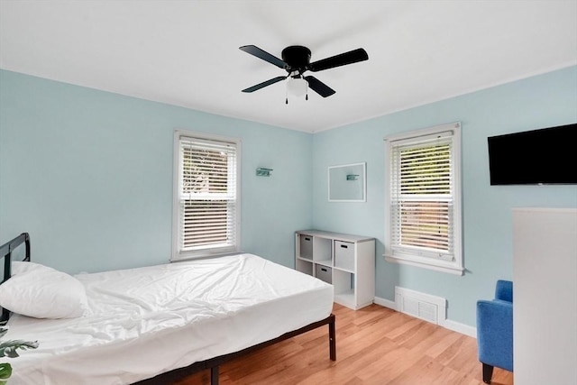 122 Brookside Cir, Springfield, MA 01129 - bedroom featuring multiple windows, light wood-type flooring, and ceiling fan