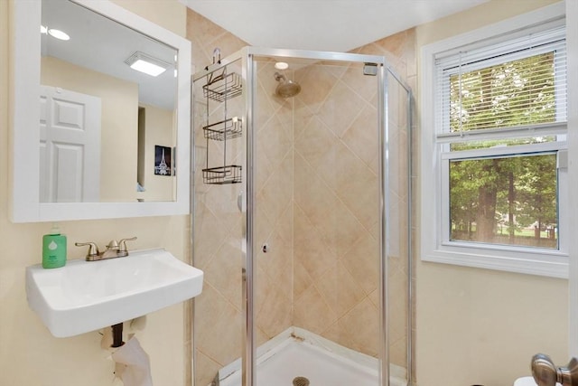 122 Brookside Cir, Springfield, MA 01129 - bathroom featuring a stall shower and a sink