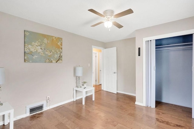 122 Brookside Cir, Springfield, MA 01129 - unfurnished bedroom featuring wood finished floors, a closet, and ceiling fan