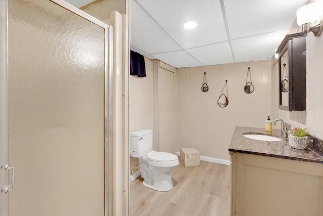 122 Brookside Cir, Springfield, MA 01129 - full bathroom with wood finished floors, vanity, a shower stall, and a paneled ceiling
