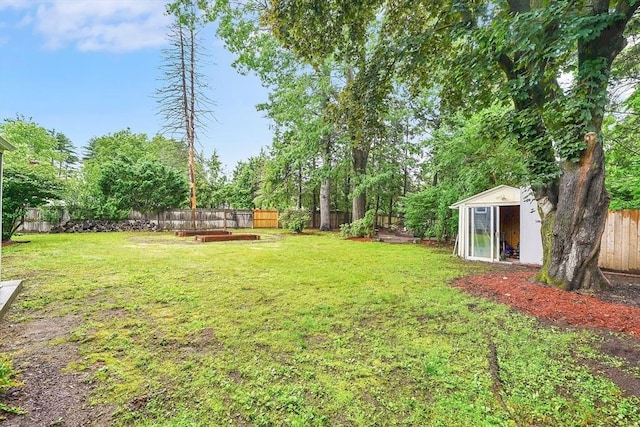 122 Brookside Cir, Springfield, MA 01129 - fenced backyard featuring a shed