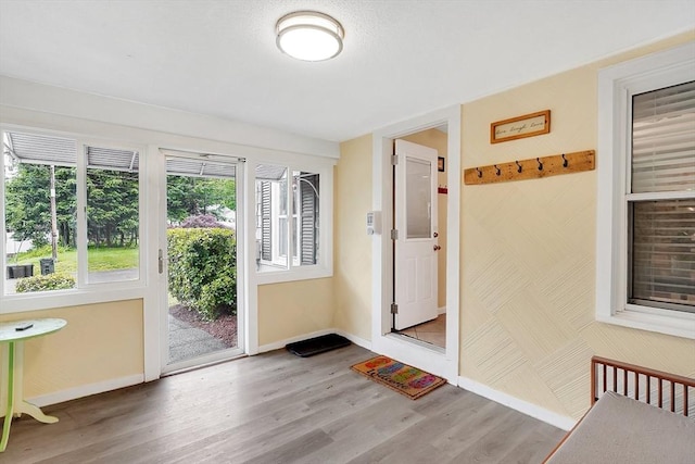 122 Brookside Cir, Springfield, MA 01129 - entryway featuring baseboards and wood finished floors