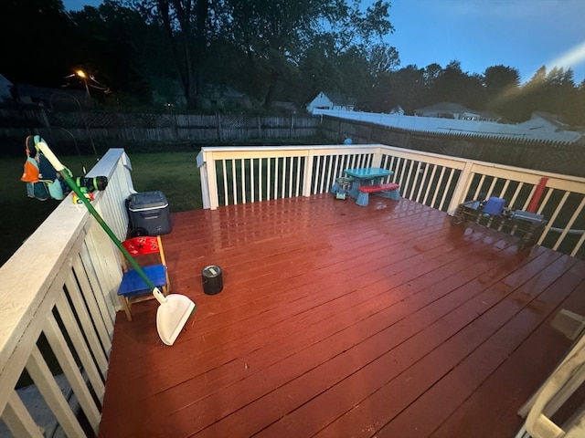 wooden deck with a yard