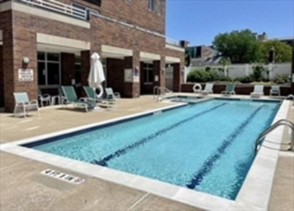 pool with a patio area
