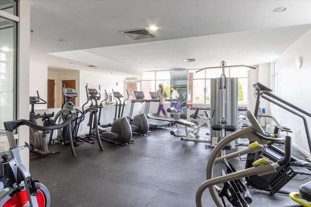 gym with recessed lighting and visible vents