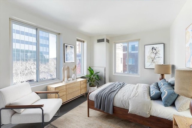 bedroom featuring wood finished floors