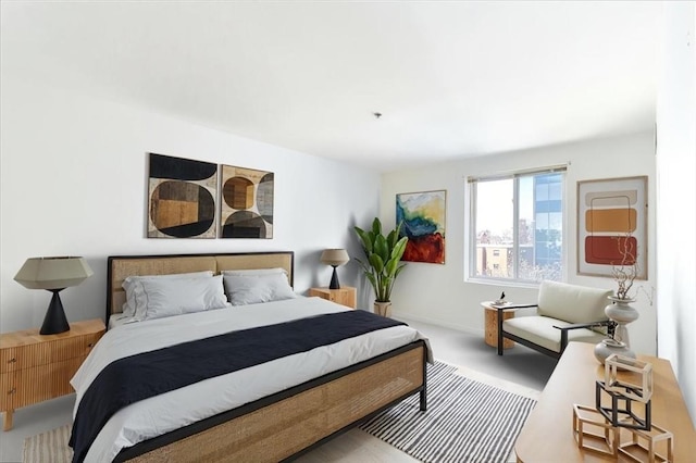bedroom featuring baseboards and carpet flooring