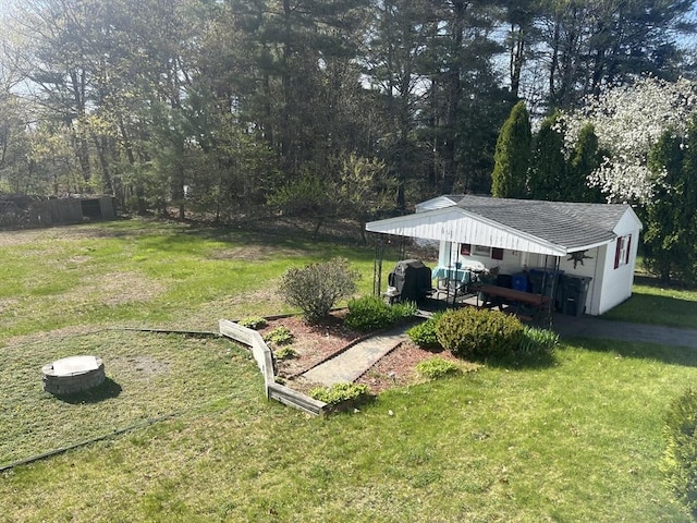 view of yard with a gazebo and a carport