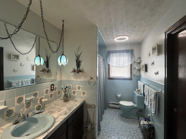 full bath featuring tile patterned floors, baseboard heating, toilet, and tile walls