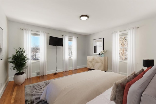 bedroom featuring hardwood / wood-style floors