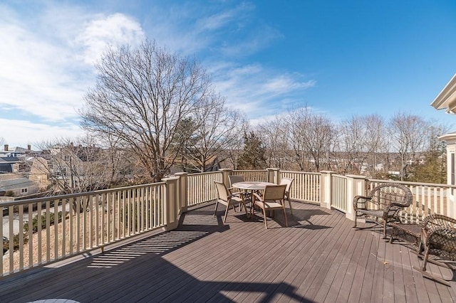 wooden deck with outdoor dining area