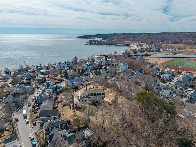 bird's eye view featuring a residential view and a water view