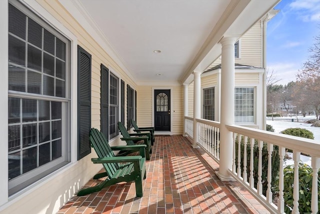 balcony featuring covered porch