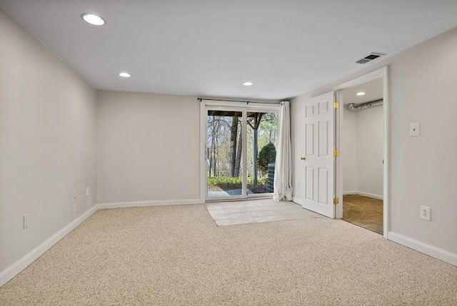 unfurnished room with baseboards, carpet flooring, recessed lighting, and visible vents