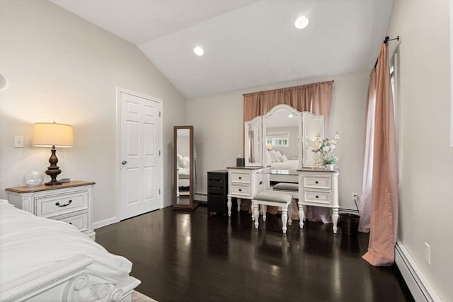 9 Indian Rock Dr, Saugus, MA 01906 - bedroom with a baseboard heating unit, vaulted ceiling, dark wood-style flooring, baseboards, and recessed lighting