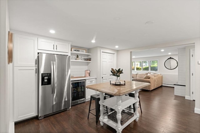 9 Indian Rock Dr, Saugus, MA 01906 - kitchen featuring stainless steel fridge, wine cooler, dark wood-style flooring, white cabinetry, and recessed lighting
