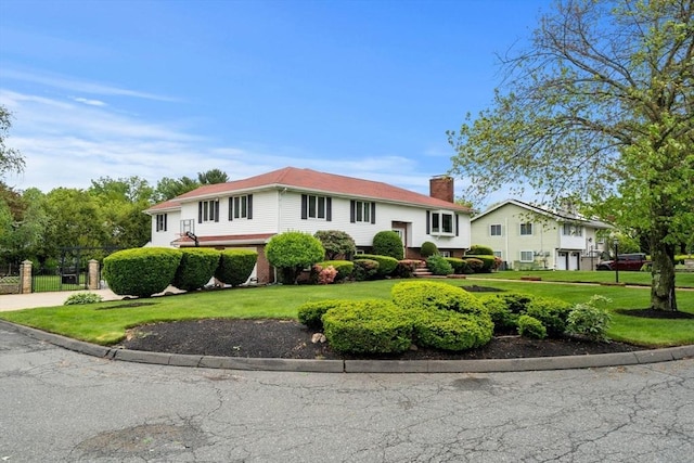 9 Indian Rock Dr, Saugus, MA 01906 - raised ranch featuring a chimney