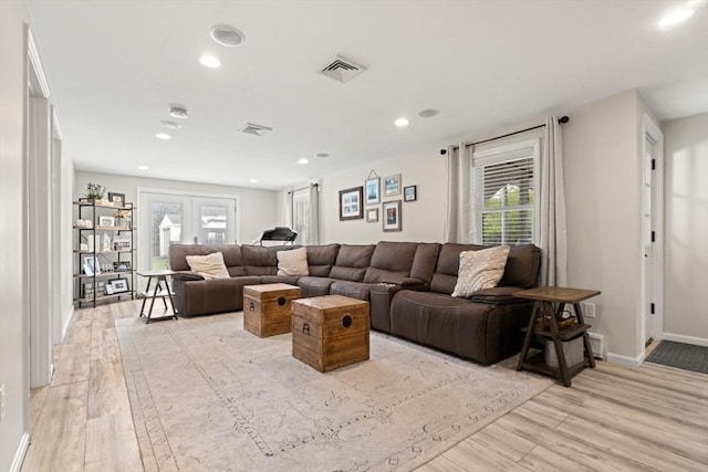 9 Indian Rock Dr, Saugus, MA 01906 - living area with light wood-style floors, healthy amount of natural light, recessed lighting, and baseboards