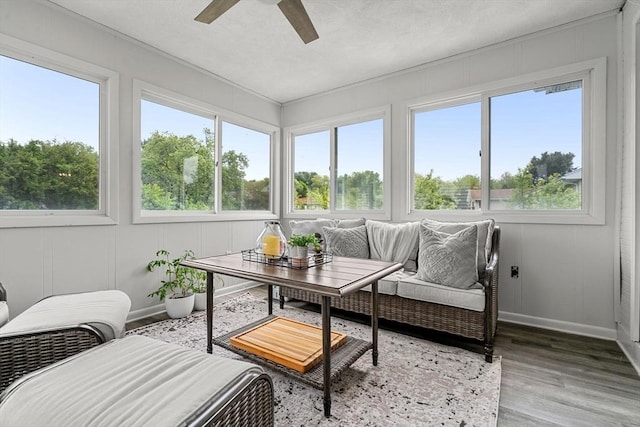 9 Indian Rock Dr, Saugus, MA 01906 - sunroom / solarium featuring wood finished floors, baseboards, and a decorative wall