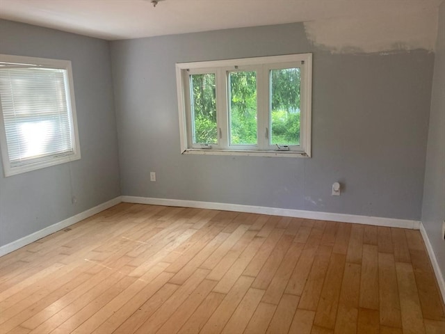 44 Tallawanda Rd, Swansea, MA 02777 - unfurnished room with light wood-type flooring and baseboards