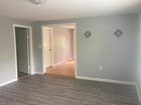 44 Tallawanda Rd, Swansea, MA 02777 - spare room with baseboards and wood finished floors