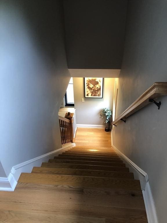 216 Fairbanks St, West Boylston, MA 01583 - stairway with wood finished floors and baseboards