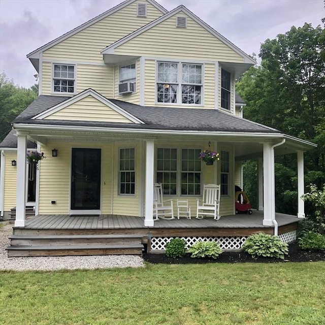 216 Fairbanks St, West Boylston, MA 01583 - view of front of property featuring covered porch, a front lawn, cooling unit, and roof with shingles