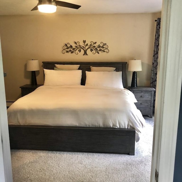 216 Fairbanks St, West Boylston, MA 01583 - carpeted bedroom featuring a baseboard radiator and a ceiling fan