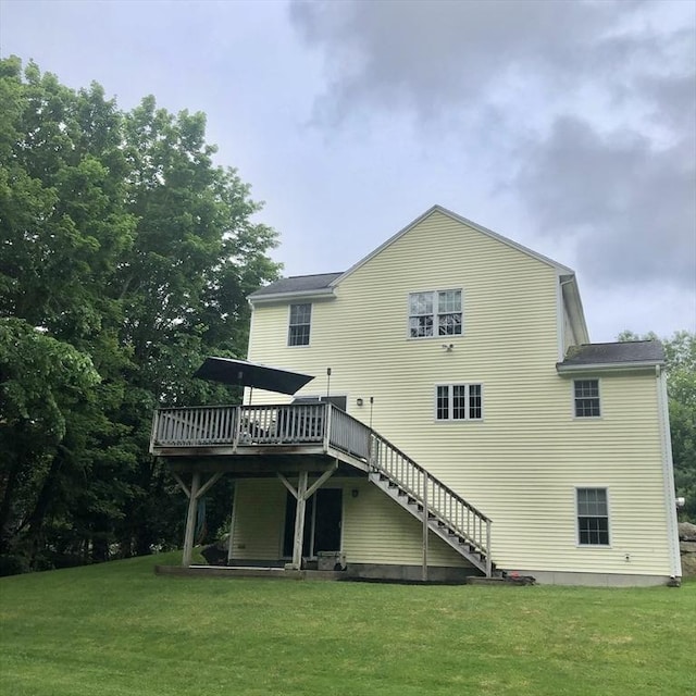 216 Fairbanks St, West Boylston, MA 01583 - rear view of property with a wooden deck, a lawn, and stairs