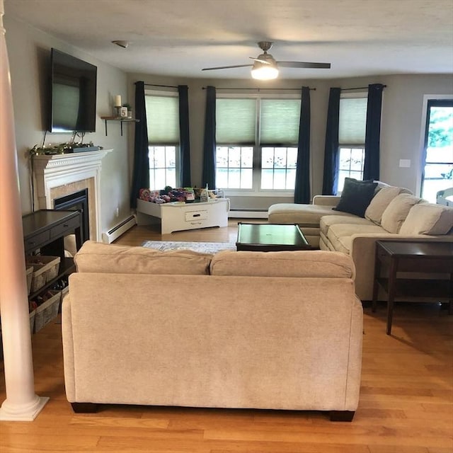 216 Fairbanks St, West Boylston, MA 01583 - living room featuring plenty of natural light, light wood-type flooring, and a ceiling fan