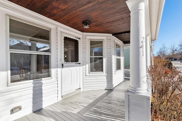 wooden deck featuring covered porch