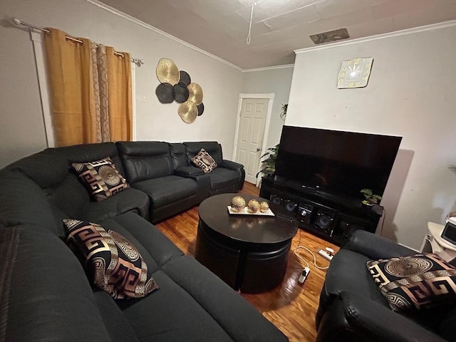 living room featuring hardwood / wood-style floors and ornamental molding