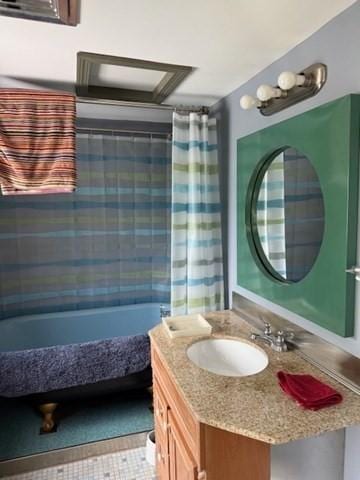 45 Spring St, Lunenburg, MA 01462 - bathroom featuring vanity and shower / bath combination with curtain
