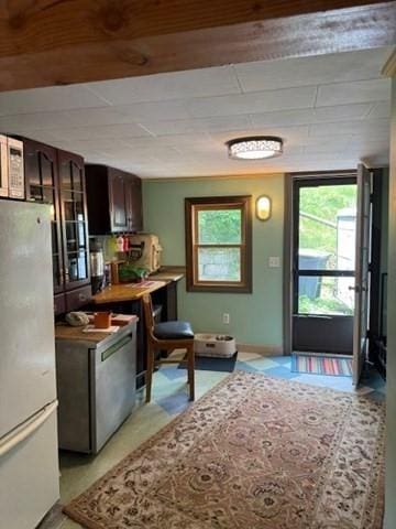 45 Spring St, Lunenburg, MA 01462 - kitchen with freestanding refrigerator and dark brown cabinetry