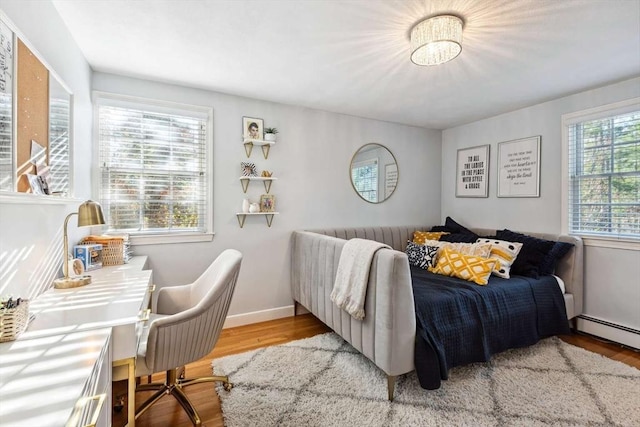 bedroom featuring light wood-type flooring