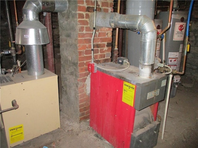 utility room featuring a heating unit and water heater