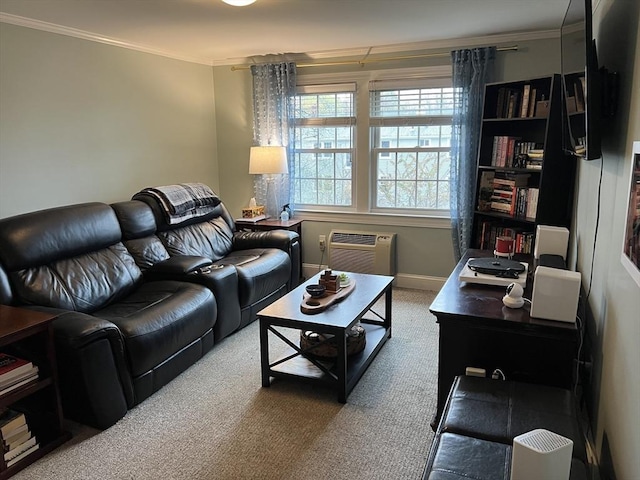 carpeted living room featuring baseboards and ornamental molding