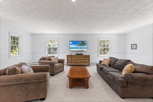 160 Woodland Mead, Hamilton, MA 01982 - living room with plenty of natural light, light carpet, a baseboard radiator, recessed lighting, and a textured ceiling