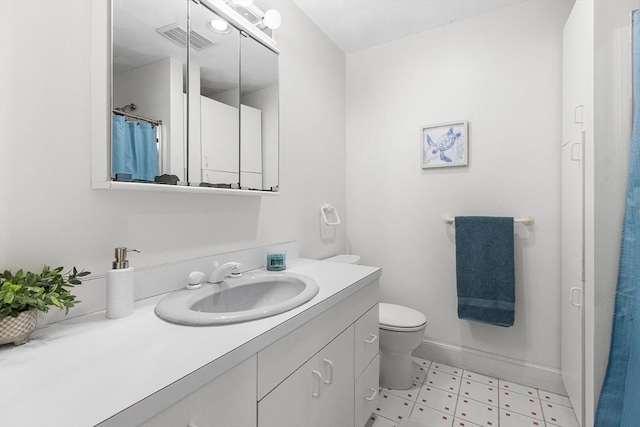 160 Woodland Mead, Hamilton, MA 01982 - full bath featuring vanity, tile patterned floors, toilet, and baseboards