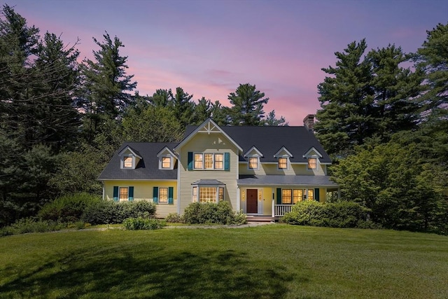 160 Woodland Mead, Hamilton, MA 01982 - traditional-style house with covered porch, a chimney, and a front lawn