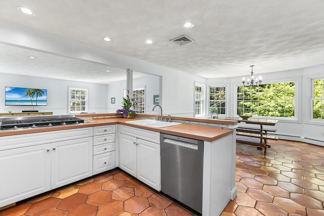 160 Woodland Mead, Hamilton, MA 01982 - kitchen with stainless steel appliances, a sink, recessed lighting, white cabinetry, and a chandelier