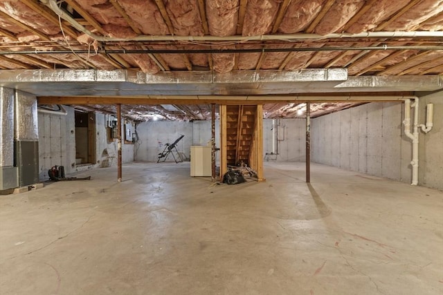 basement featuring washer / clothes dryer and electric panel