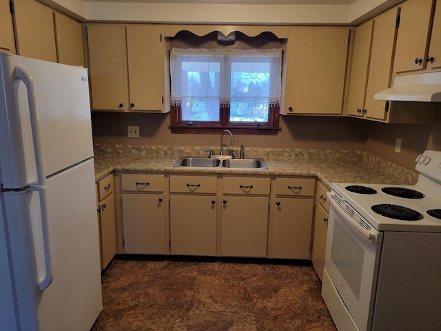 kitchen with white appliances, sink, and cream cabinets