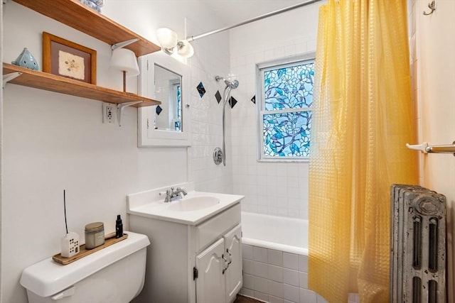 111 Williams St Unit 1, Boston, MA 02130 - bathroom with tiled shower / bath combo, vanity, toilet, and radiator heating unit